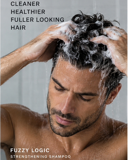 Man shampooing his hair with Fuzzy Logic Strengthening Shampoo
